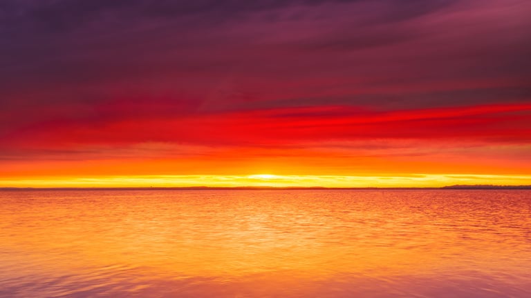 Orange Ocean Water during Sunset